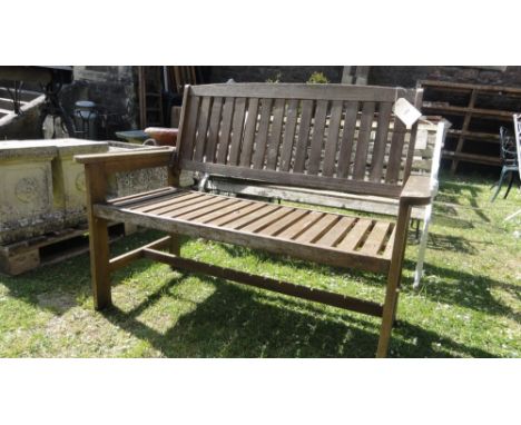 A contemporary hardwood two seat garden bench with slatted seats and back.