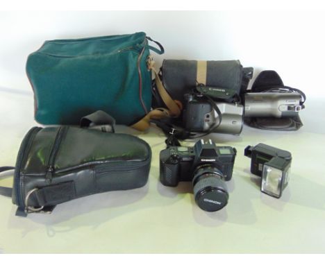 A collection of vintage cameras and accessories.