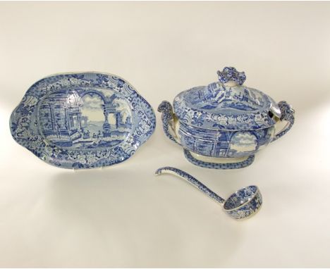 A large early 19th century blue and white transfer printed two handled soup tureen, cover, stand and matching ladle, possibly