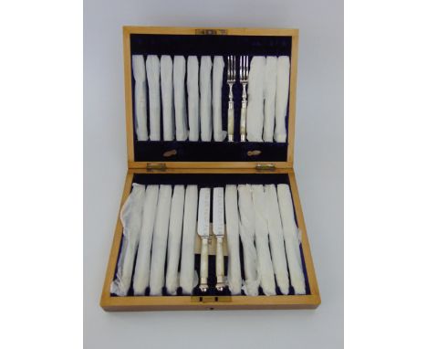 A cased set - twelve pairs of dessert knives and forks with silver plated blades and mother of pearl handles; together with a