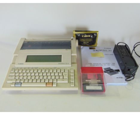 A Canon Star Writer 30-II electric typewriter and accessories.