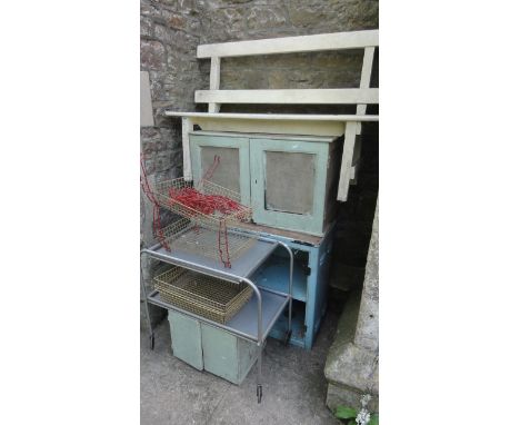 A vintage painted pine meat safe with mesh panels, a simple painted bench with plank seat beneath a railed back, painted stee