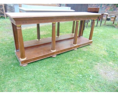 An Empire style console or pier table of rectangular form with painted (to simulate marble) top raised on an open framework w