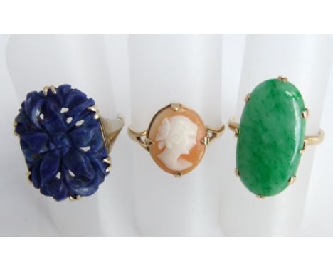 Three 9ct gold ladies rings to include a carved lapis lazuli ring, a Jade cabochon ring and a cameo ring in four prong settin