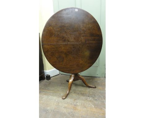 A Georgian mahogany snap top table raised on a gun barrel shaped pillar and bird cage set on a well formed tripod base, 90 cm