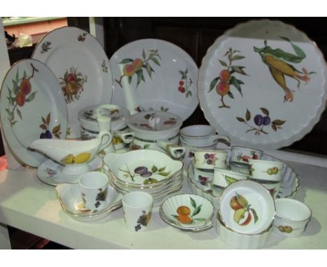 A collection of Royal Worcester Evesham pattern wares including a pair of ceramic saucepans, a large quiche dish 36 cm diamet