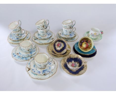 A collection of Victorian Ainsleys tea wares of fluted form with painted and gilded butterfly and grass decoration comprising
