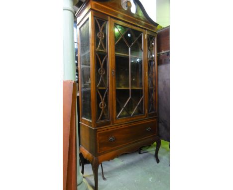 An inlaid Edwardian mahogany side cabinet with satinwood crossbanded detail, freestanding, with broken arch architectural ped