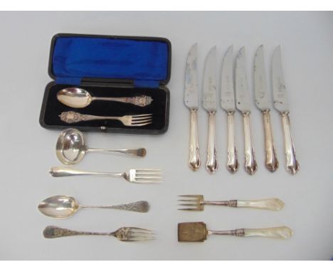 A set of six silver handled steak knives cased christening fork and spoon, Victorian jam spoon and sardine fork and further o