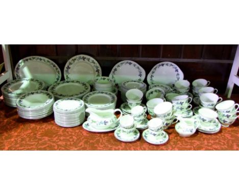 An extensive quantity of Royal Doulton Burgundy pattern dinner, tea and coffee wares, pattern number TC1001, including oval m