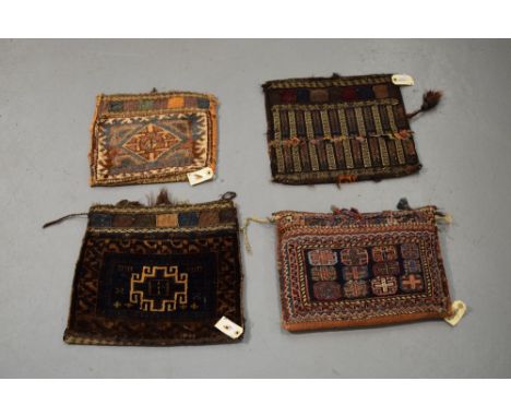 Nine weavings comprising:  three Baluchi khorjins, Khorasan, north east Persia, 20th century  One flatweave and now a cushion