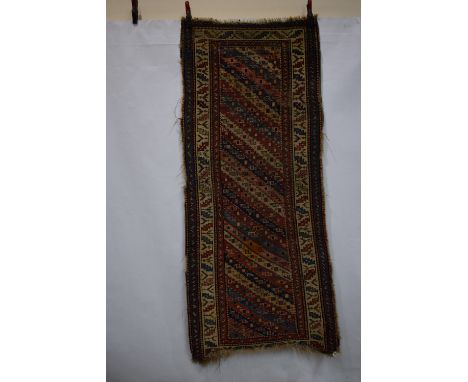 Group of four rugs comprising Tekke Turkmen, Turkmenistan, first half 20th century, 4ft. 4in. X 3ft. 1.32m. X 0.91m. Washed a