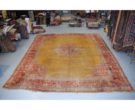 Ushak carpet, now reduced in length, west Anatolia, late 19th/early 20th century,  19ft. 2in. X 16ft. 8in. 5.85m. X 5.08m. Ov