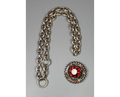 Victorian white metal Scottish pebble brooch together with a white metal hollow link chain. Test as silver.(B.P. 21% + VAT) 