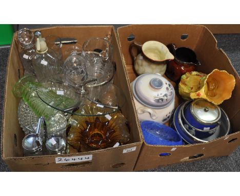 Two boxes: one of largely glassware including: a decanter and a vintage soda syphon and another with ceramic jugs and a blue 