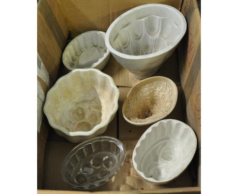 Box containing six, mainly 19th Century, jelly moulds, including one marked with a 'V', five ceramic and one glass. (6)(B.P. 