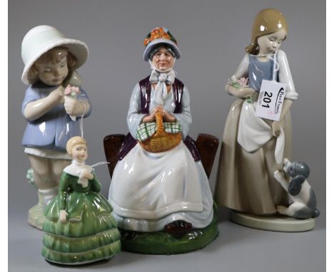 Royal Doulton bone china figurine 'Rest awhile' HN2728, together with another Royal Doulton bone china figurine, and a Nao Sp