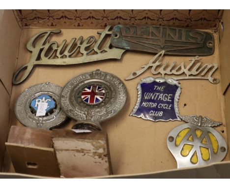 Box of car mascots and cat badges to include Royal Automobile Club Association, AA, The Vintage Motorcycle Club, RAC, etc.(B.