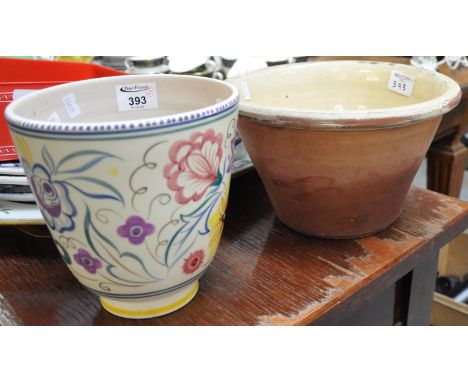 Small terracotta and cream crochan (dairy cream bowl) together with a hand made Poole pottery vase decorated with stylised fl