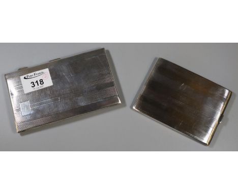 Two silver engine turned cigarette cases. Birmingham hallmarks. 11.9 troy oz approximately.(B.P. 21% + VAT) 