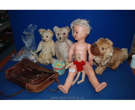 A box of old children's toys including Teddy bears, dog, doll, leather satchel, etc