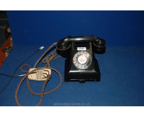 A vintage dial Telephone, black.