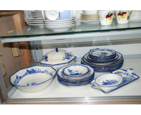 A Royal Doulton 'Norfolk' part Dinner service including tureen, large bowl, dessert bowls, seven dinner plates, four tea plat