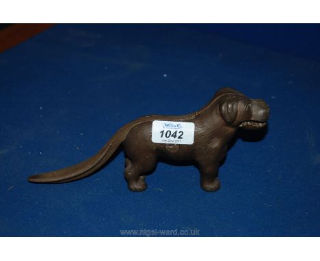 A metal nutcracker in the form of a dog