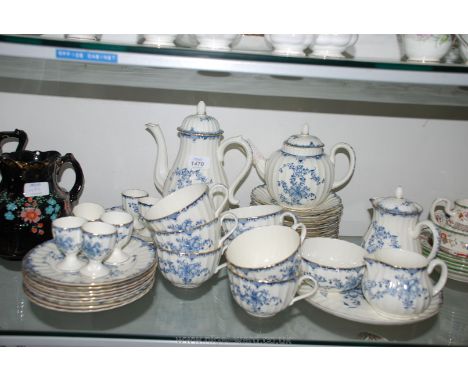 A Royal Worcester ''Mansfield'' pattern Breakfast service including egg cups, teapot, water jug, coffee pot, bread plate, sid