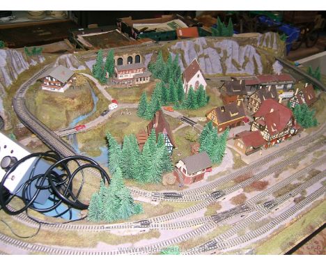 A large, carefully planned and well modelled "N" gauge (9 mm approx.) model Railway Layout mounted on a base board measuring 