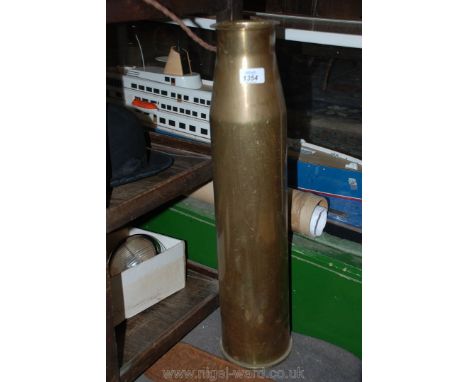 A brass shell case stick stand