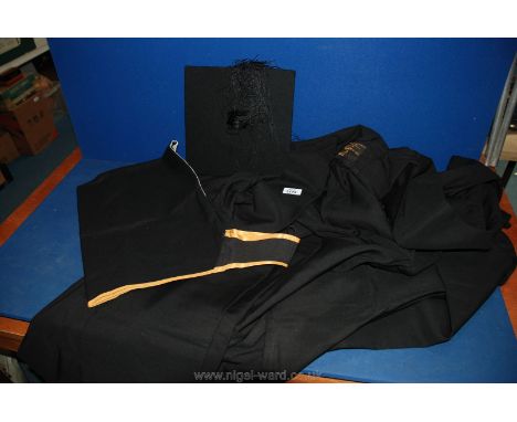A graduation Gown, Mortar Board and Sash