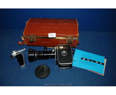 A Bolex Camera in a leather case with instructions