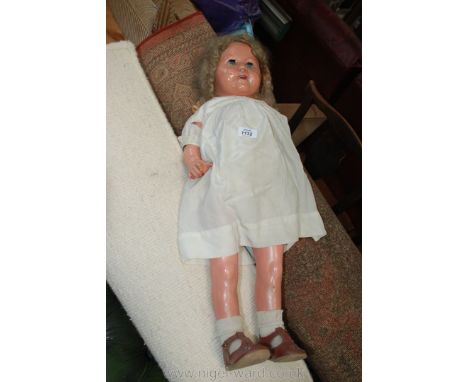 A vintage Doll in original clothes and shoes, 27" tall