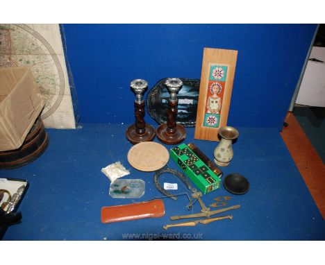 A box of miscellanea including candlesticks, telescope, scales, etc.