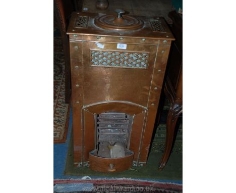A British made Pithers radiant Stove 'Pitradsto' Cast and Copper Anthracite burner, Art Nouveau in style with circular lid to