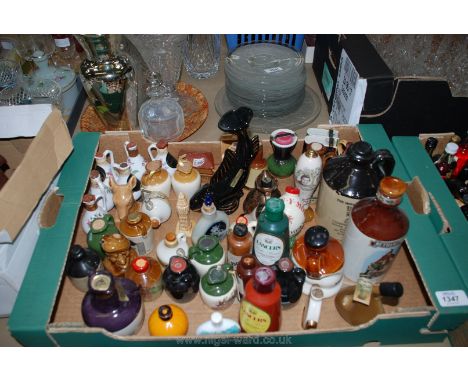A quantity of miniature decanters including Cherry Brandies, Scotch Whiskey, Bells Whiskey, Cornish Mead, etc