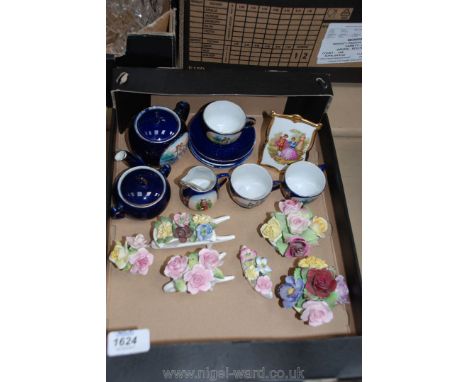 A quantity of china including floral encrusted posies, doll's tea service with romantic scenes, Limoges picture ornament, etc