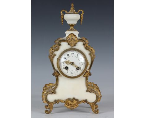 A late 19th century French ormolu mounted white marble mantel clock, the eight day movement with platform escapement and stri