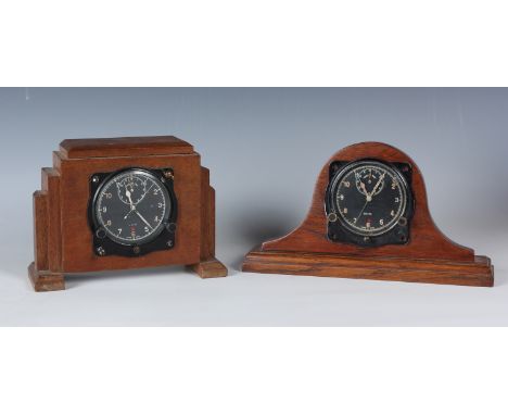 A Second World War period Air Ministry cockpit clock by S. Smith &amp; Sons (HA) Ltd London, the signed black dial detailed '