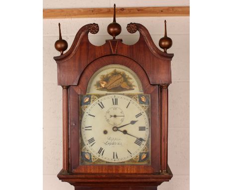 A 19th century oak and mahogany crossbanded longcase clock with eight day movement striking on a bell, the 12-inch painted br