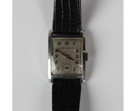 A Girard Perregaux rectangular steel cased wristwatch, the signed jewelled GXM caliber movement numbered '86 1735', the signe