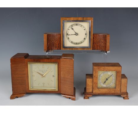 A mid-20th century walnut cased mantel timepiece, the silvered dial with gilt Arabic numerals and baton hour markers, inscrib