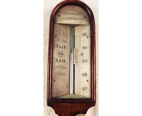 A Victorian rosewood cased stick barometer, the arched ivorine dial with vernier scale and inscribed 'G. Guarnerio Scarboroug