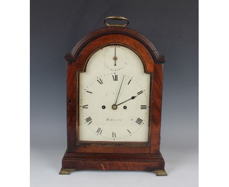 A George III mahogany bracket clock with brass twin fusee movement striking quarters and hours on two bells, the anchor escap