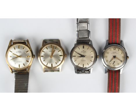 A Garrard 9ct gold circular cased gentlemen's wristwatch with signed jewelled movement, the signed silvered dial with gilt ba
