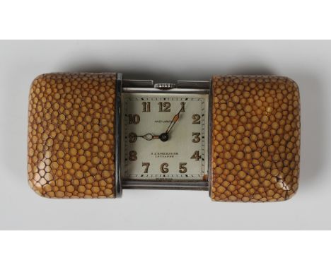 A Movado silver and pale brown stained shagreen rectangular cased travelling purse watch, the square silvered dial with Arabi