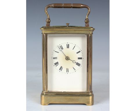 A late 19th century/early 20th century French brass cased carriage clock with eight day movement striking hours and half hour