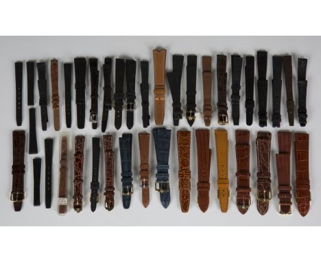 A collection of twenty-four Omega black and brown leather wristwatch straps, some with Omega buckles, together with a collect
