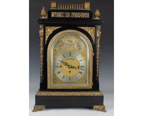 An impressive Victorian ebonized and brass mounted bracket clock with eight day triple fusee movement chiming quarters on eig